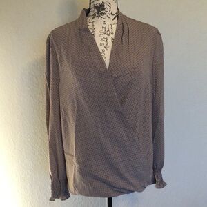 Adrianna papell long sleeve blouse it’s a tanish  multi color. Small pattern.
